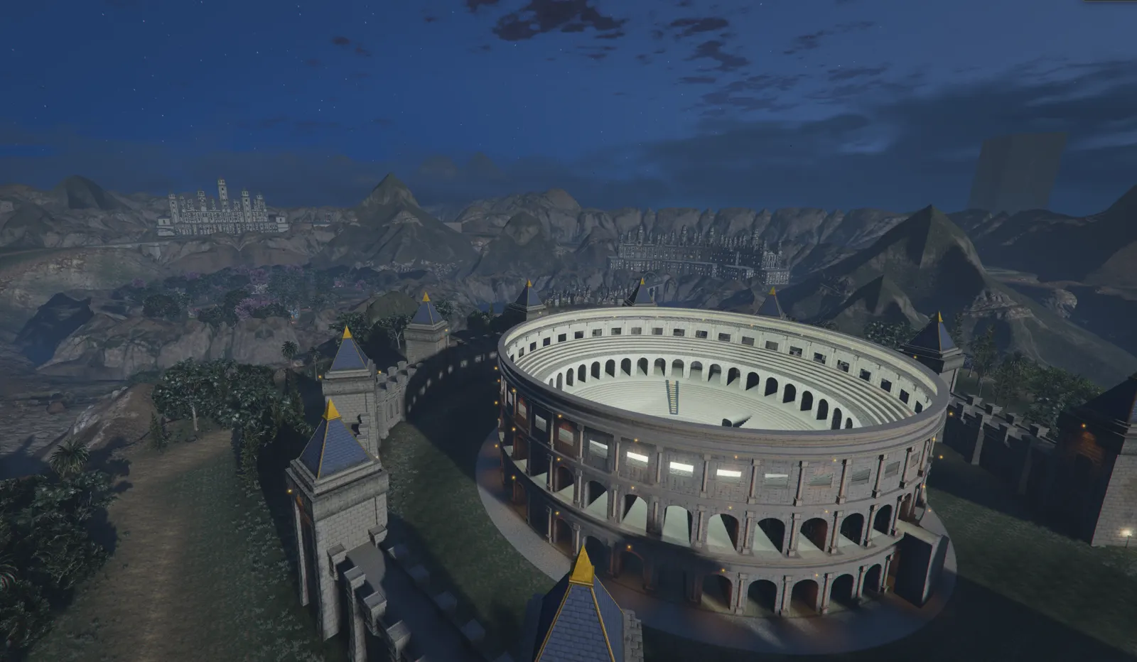 El coliseo en verano, con el pueblo detrás